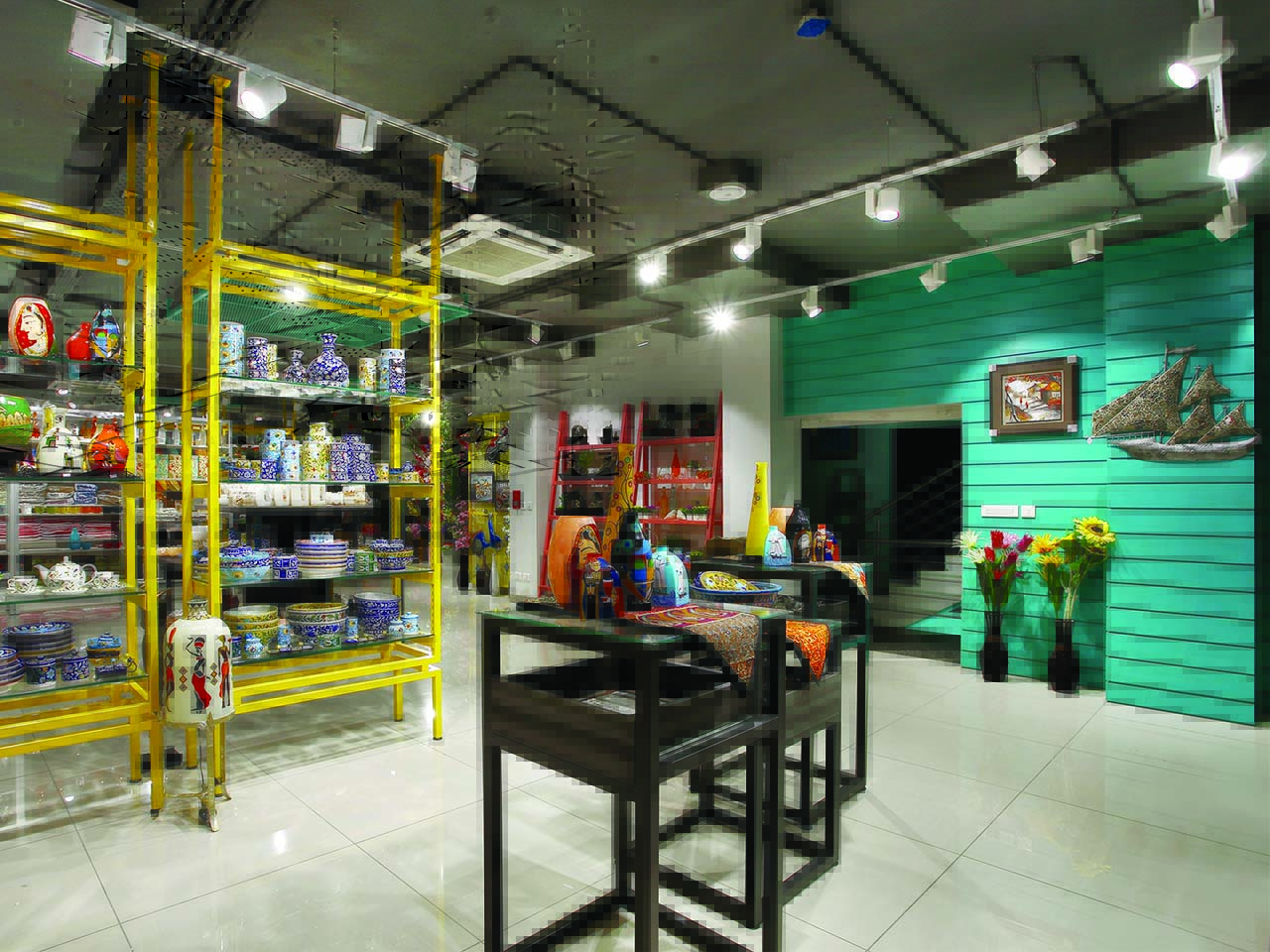 Variety of cutlery at display in the Tesor home decor retail store designed by StudioJ