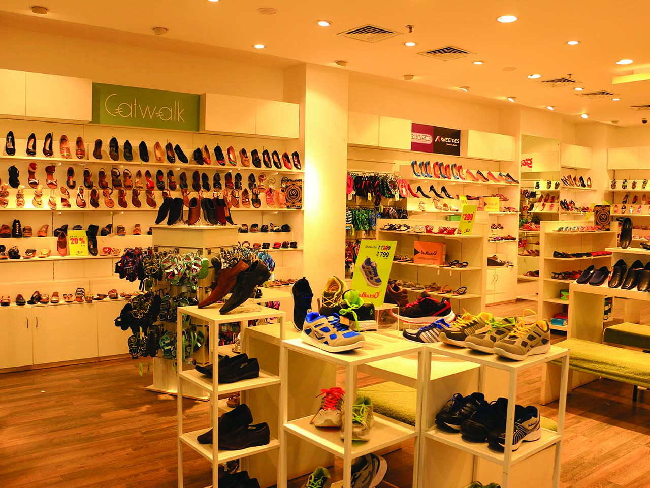 Furniture designed by StudioJ displaying VKC Footwear products